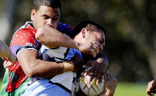 Ballina’s Joel Roberts is wrapped up by the Northern United defence in the preliminary semi-final at Oakes Oval, Lismore, on Sunday. Ballina’s Joel Roberts is wrapped up by the Northern United defence in the preliminary semi-final at Oakes Oval, Lismore, on Sunday.